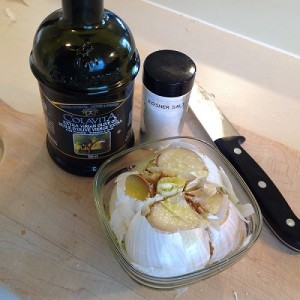Top the elephant garlic, drizzle with olive oil, and sprinkle with salt.